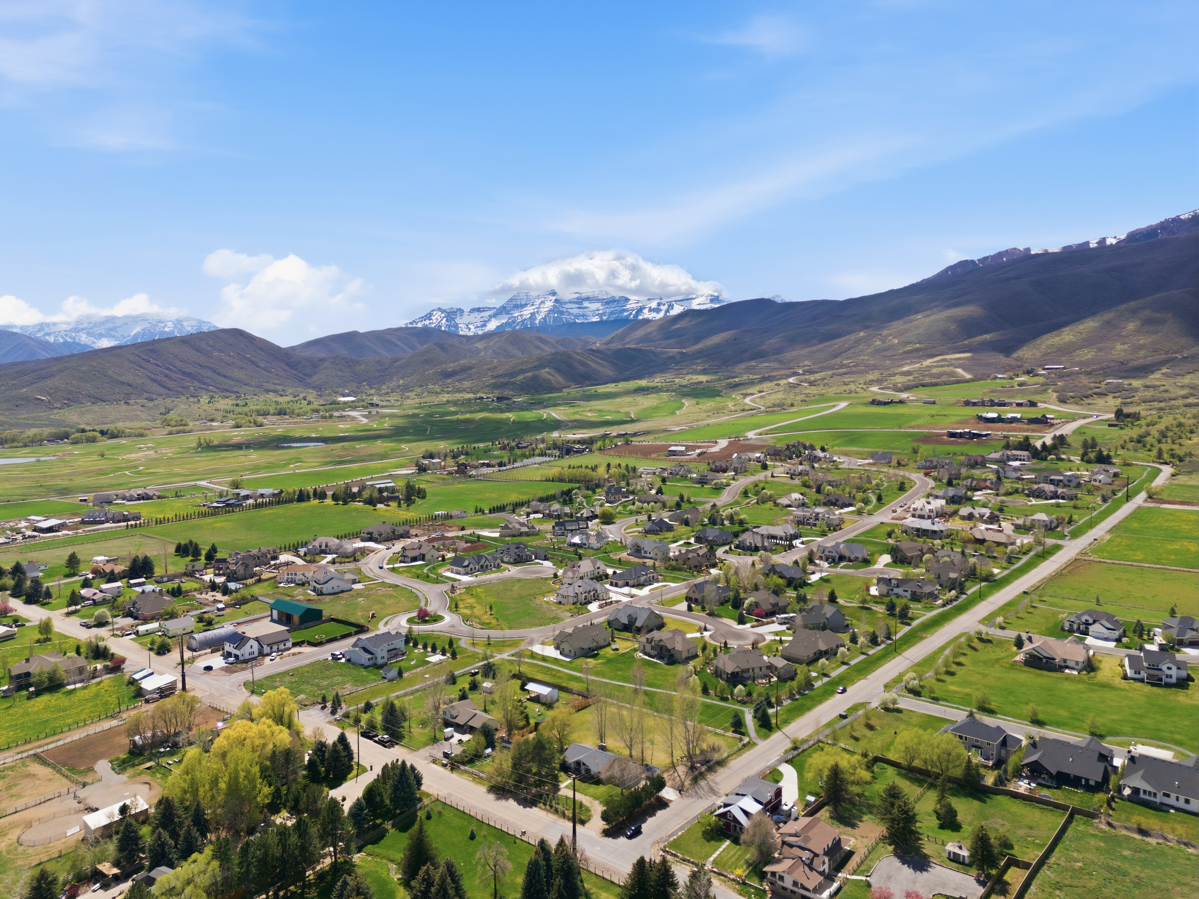 Midway Utah aerial drone view with Mount Timpanogos and Wasatch Range in the distance
