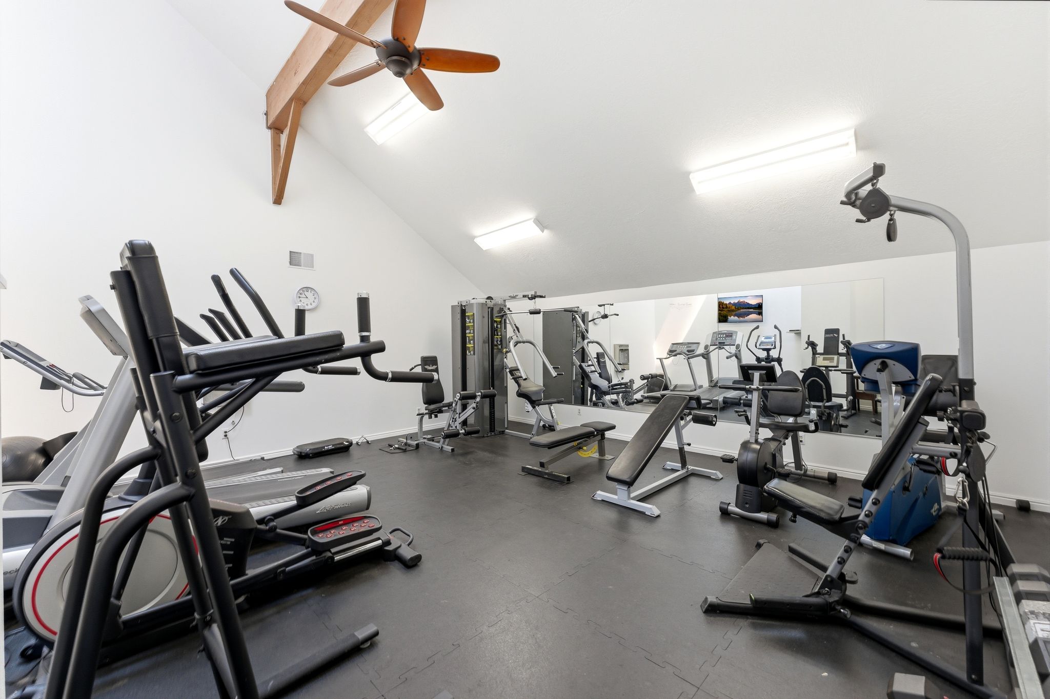 Swiss Oaks community fitness room with cardio and strength equipment in Midway Utah