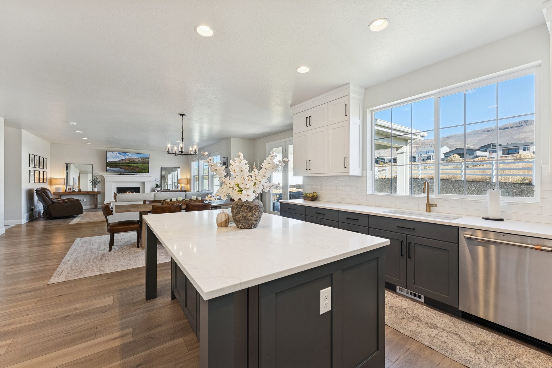 Luxury kitchen interior with island, quartz countertops, and custom cabinetry in a Heber Valley Utah home